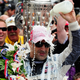 A man pouring milk atop his own head. Photo credit: Getty Images